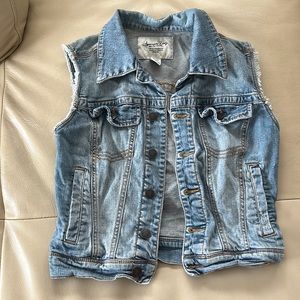 Girl jean vest.